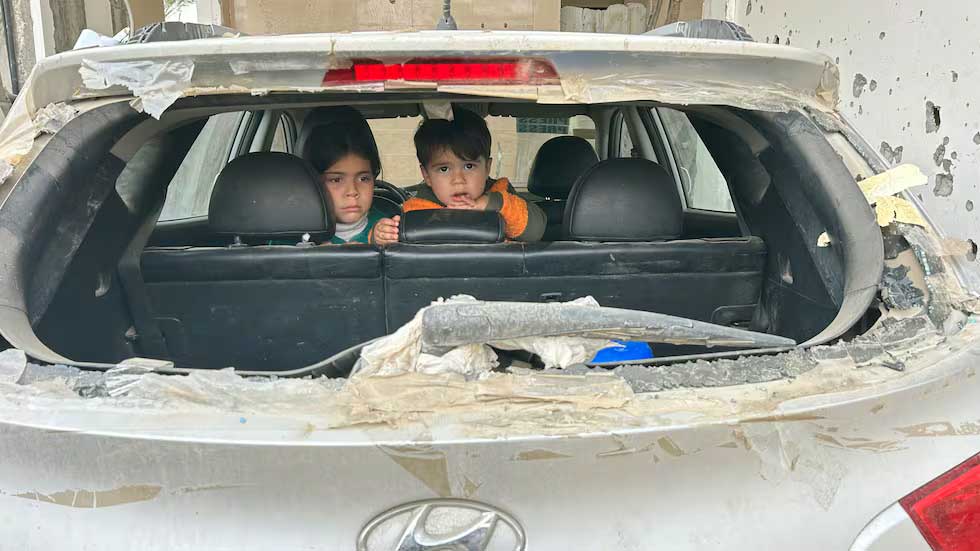 Los hijos del periodista, en el auto impactado por un bombardeo