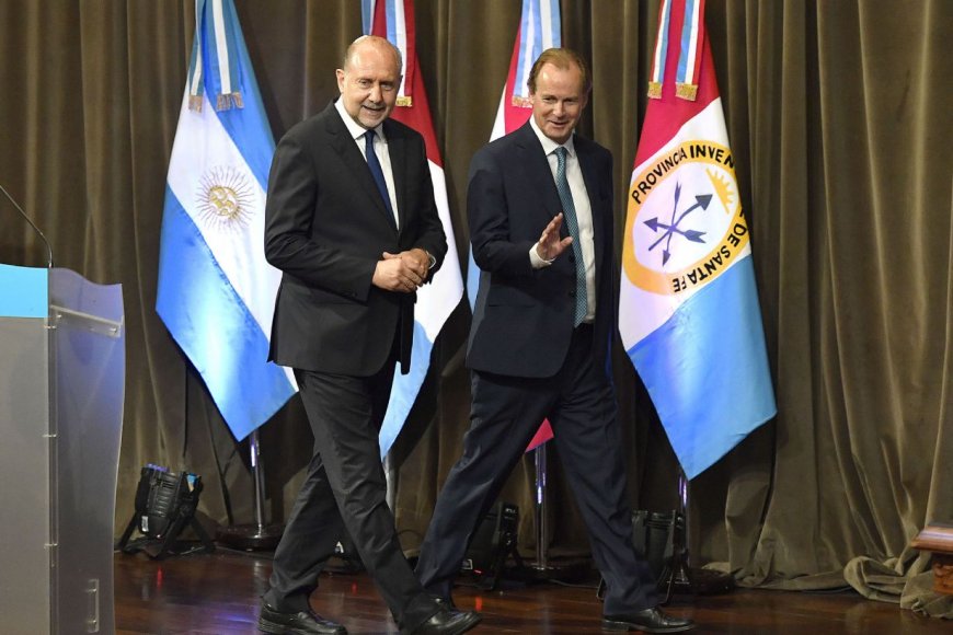 Los gobernadores Gustavo Bordet y Omar Perotti.