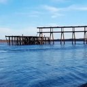 Cuerpo sin vida pasó flotando frente a pescadores en el río Uruguay