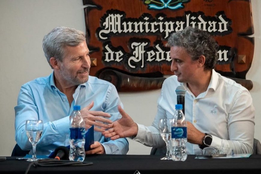 Rogelio Frigerio y Ricardo Bravo.